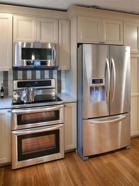 cinnamon cabinet stainless steel stove refrigerator|stainless steel kitchen cabinets.